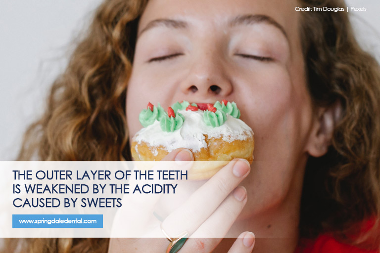 The-outer-layer-of-the-teeth-is-weakened-by-the-acidity-caused-by-sweets