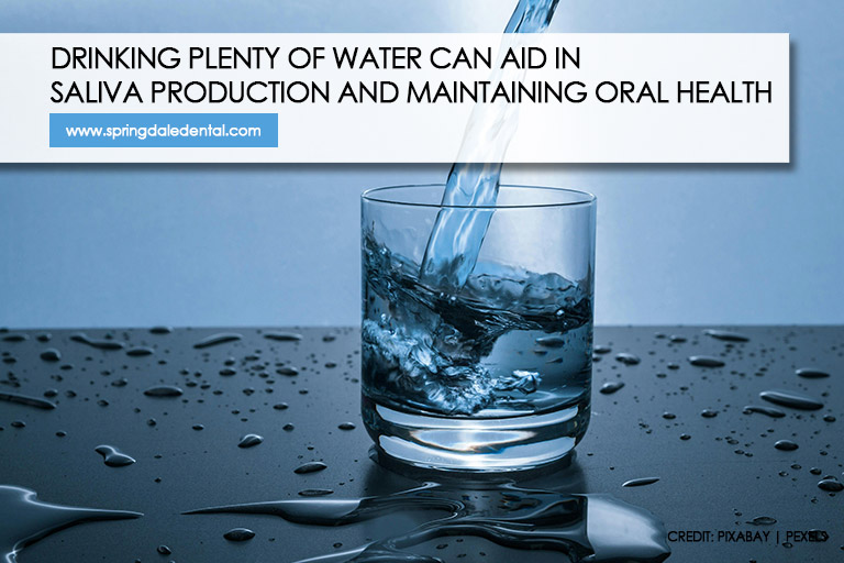 Drinking plenty of water can aid in saliva production and maintaining oral health