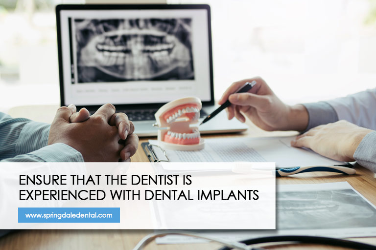 Ensure that the dentist is experienced with dental implants